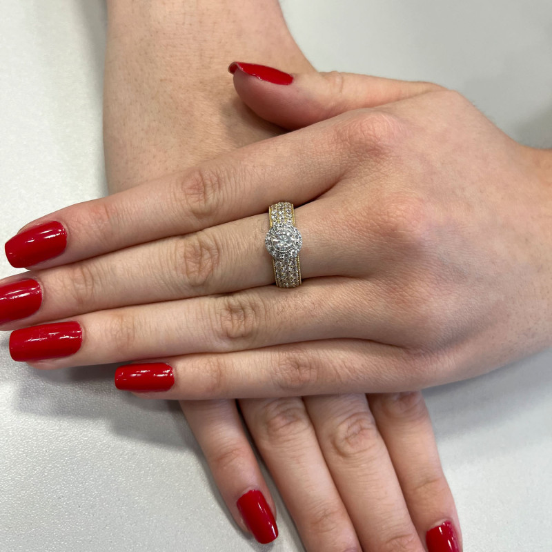 Pierścionek złoty z okrągłym zdobieniem i cyrkoniami w szynie MZ T23-R-741-YW-CZ próba 585