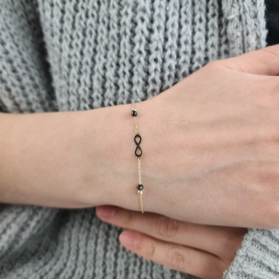 Bransoleta złota infinity, kulki i czarne cyrkonie/rolo MZ T23-B-PAN-11 próba 585
