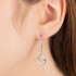 Kolczyki srebrne kropla z zawijasem i białymi cyrkoniami/big.zam. OL ZS-E661 próba 925