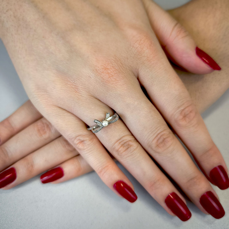 Pierścionek srebrny kokardka z cyrkoniami i perłą  JA928 próba 925