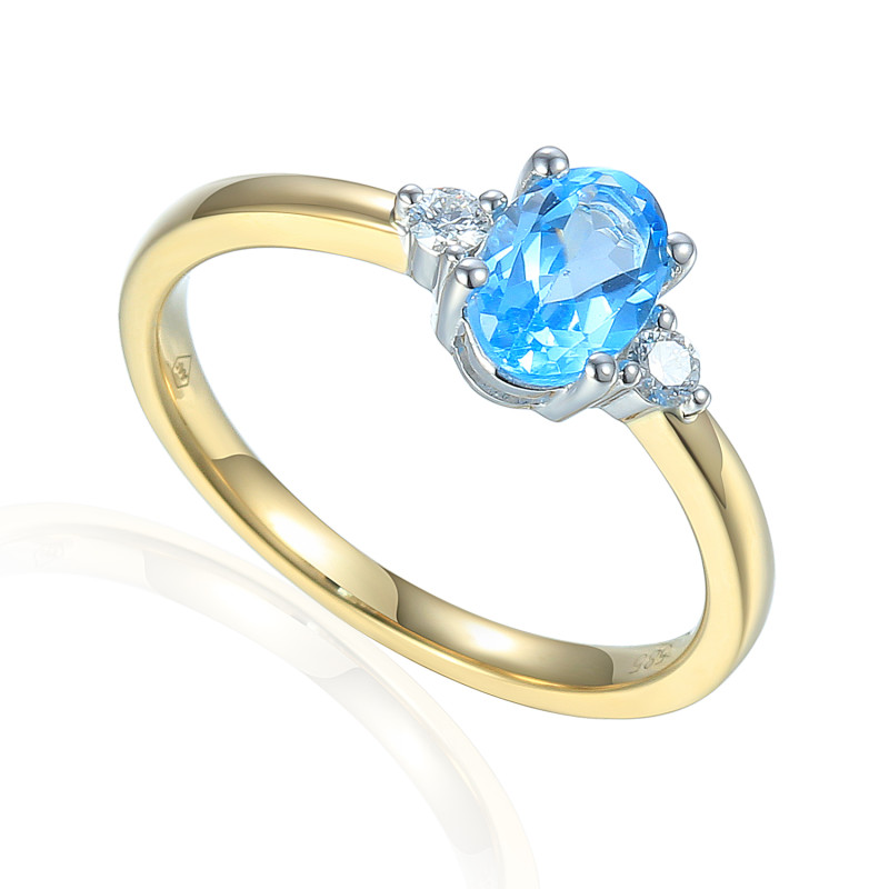 Pierścionek złoty z topazem i białymi diamentami AW 37303 YW-TO owal próba 585