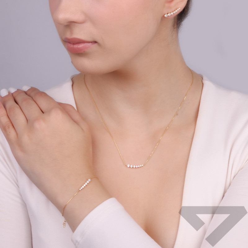 Bransoleta pozłacana białe cyrkonie narastająco/anker PW549 GOLD próba 925