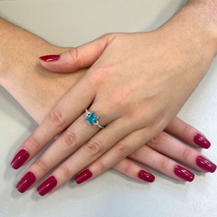 Pierścionek srebrny prostokątna niebieska cyrkonia AT747 topaz próba 925