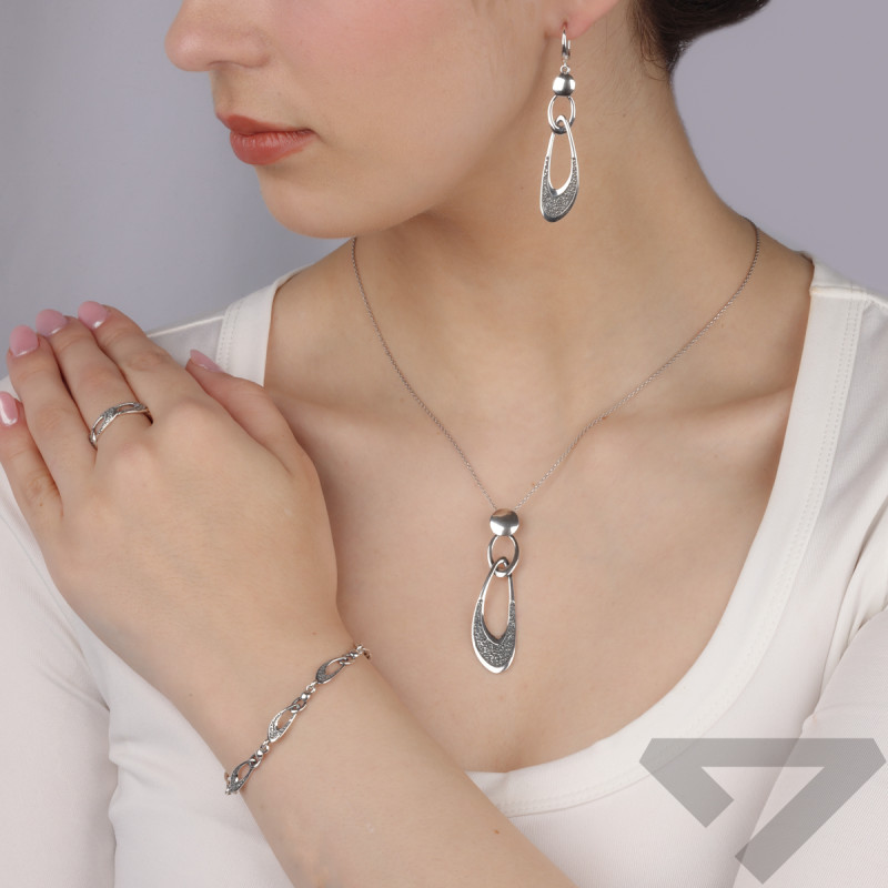 Kolczyki srebrne obły owal z młotkowaniem/ang.zap. SZ357 próba 925