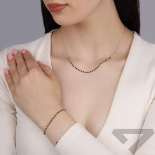 Naszyjnik złoty z grawerowanymi żółtymi i czarnymi kulkami/rolo reg. M3-381 BL próba 585