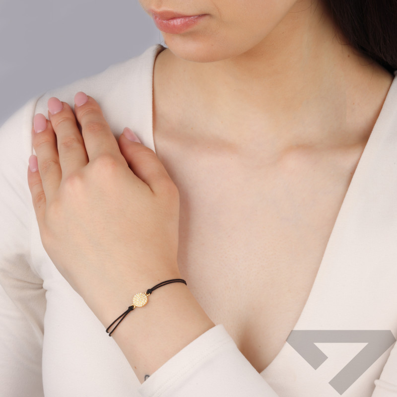 Bransoleta pozłacana koło z cyrkoniami na czarnym sznurku PW582 GOLD czarny próba 925