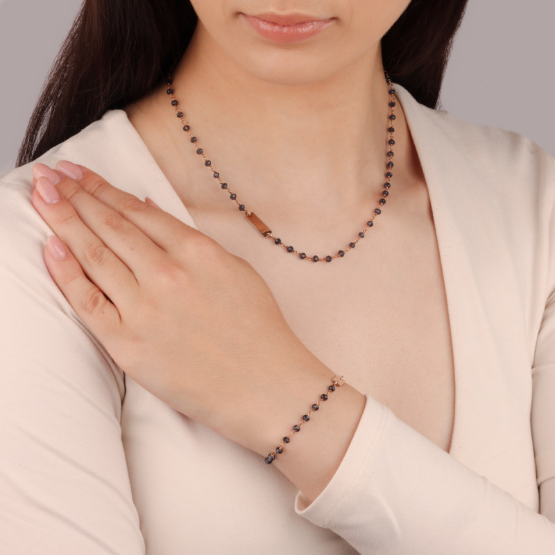 Bransoleta pozłacana z blaszką i szklanymi kulkami/rolo AX CRM-19899 próba 925