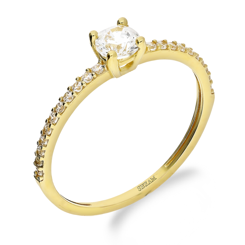 Pierścionek złoty z białą cyrkonią w czterech łapkach i cyrkonie w szynie AR 0-VXSZR0363-FCZ próba 375