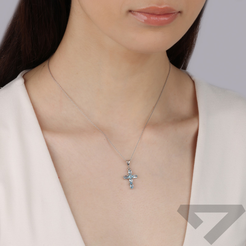 Srebrny Krzyżyk z Topazami Swiss Blue pr. 925 - JubilerSezam.pl