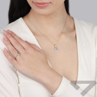 Pierścionek złoty kropla z jasno-niebieską cyrkonią próba 585