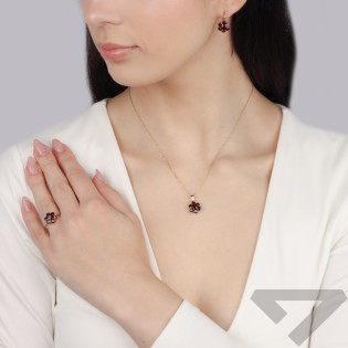 Pierścionek złoty kwiatek z granatem próba 585