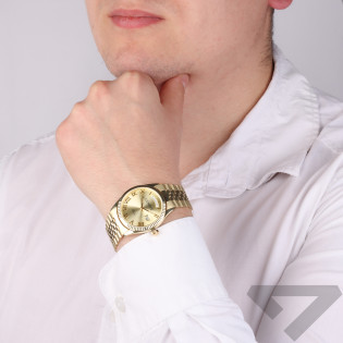 Zegarek złoty z okrągłą tarczą