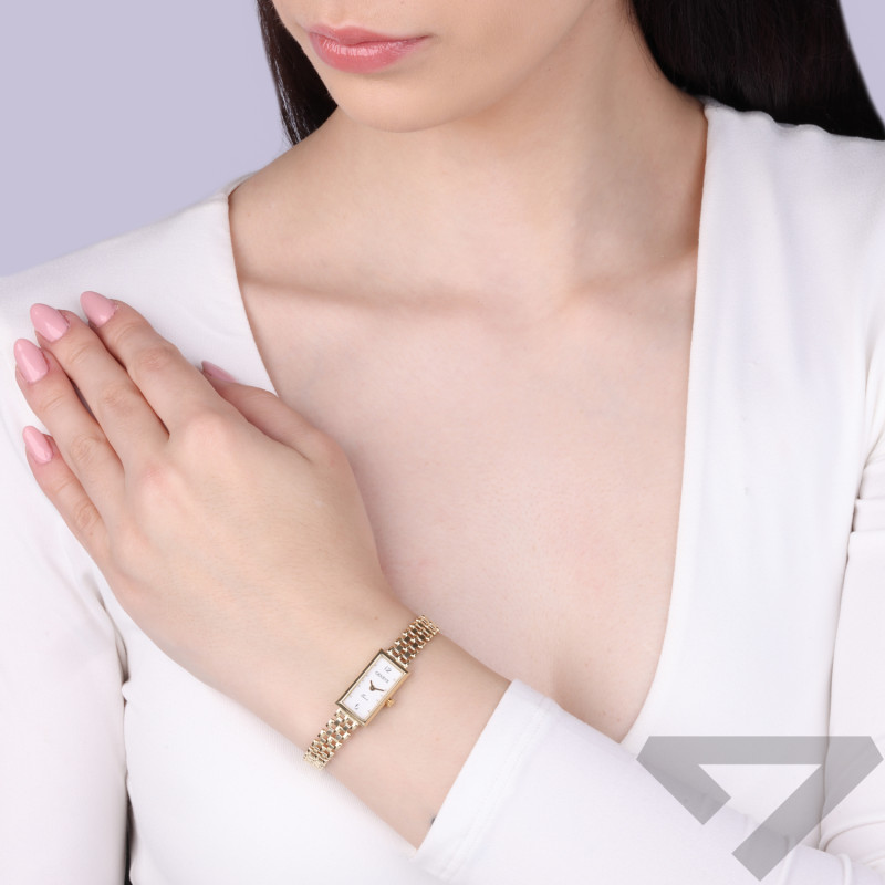 Zegarek złoty z prostokątną tarczą