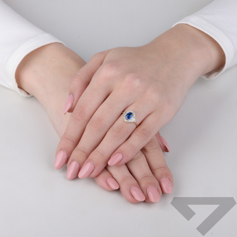 Pierścionek złoty z szafirową cyrkonią