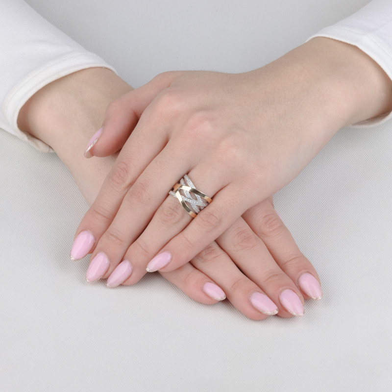 Pierścionek srebrny ażurowa przeplatanka z cyrkoniami