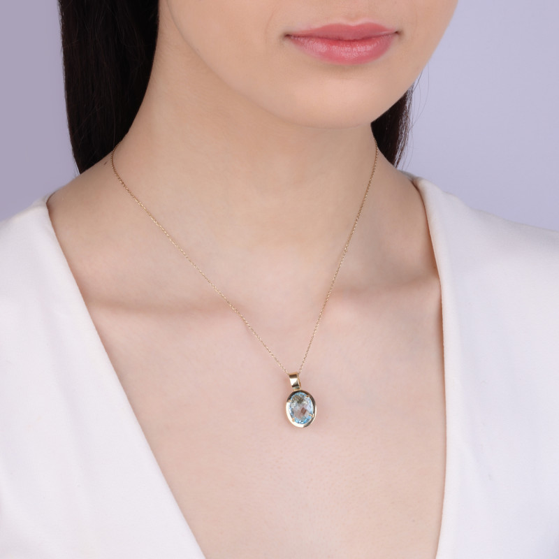 Zawieszka złota owalna markiza z jasno-niebieską cyrkonią