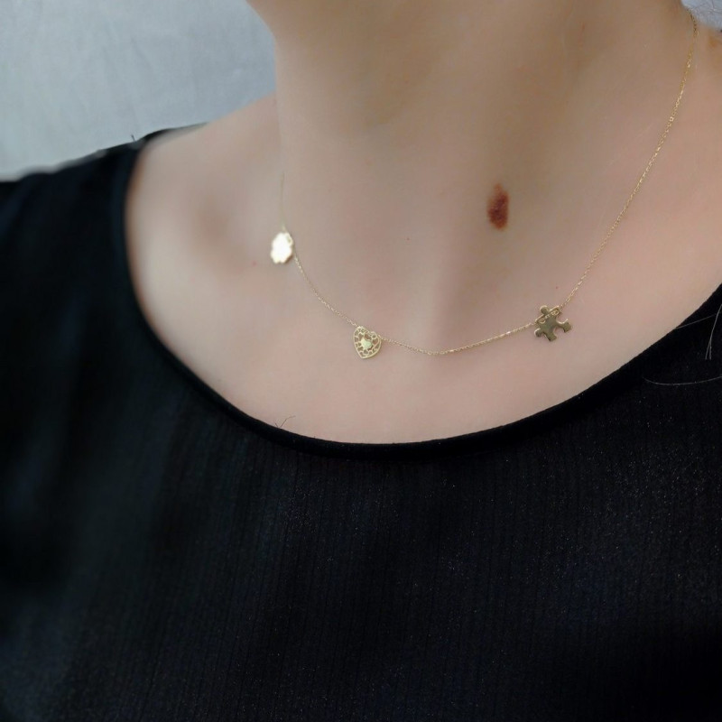 Naszyjnik złoty koniczyna, serce i puzzel próba 375