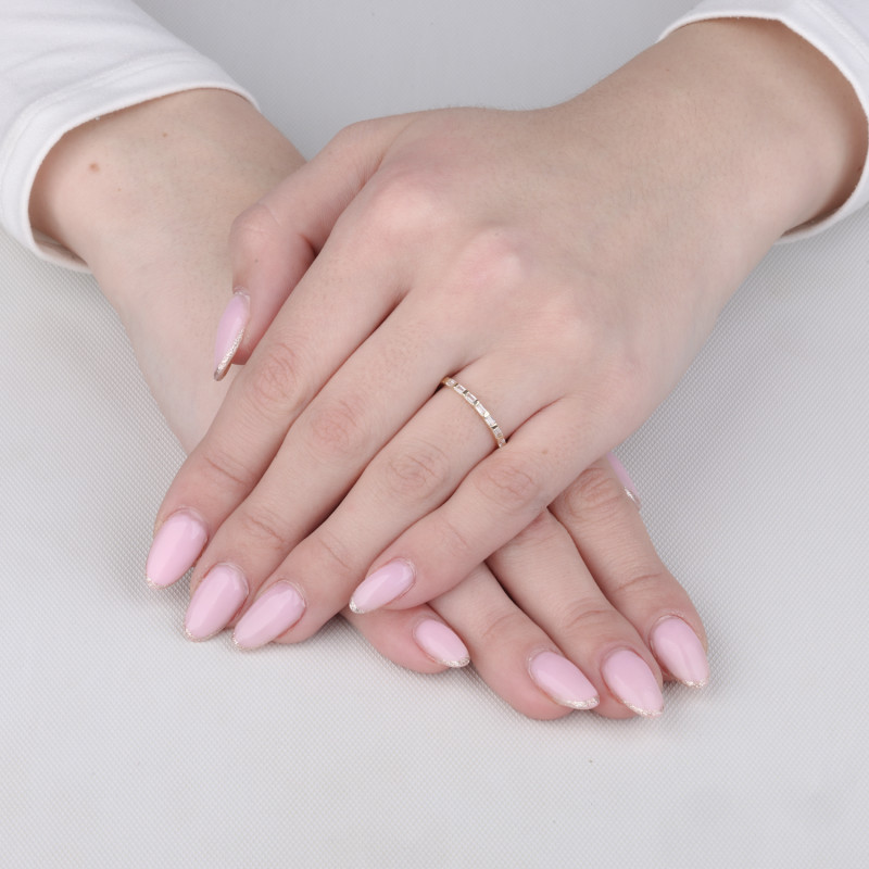 Pierścionek złoty RINGS z białymi cyrkoniami bagietami