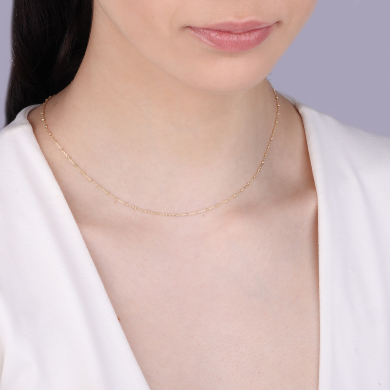 Naszyjnik złoty z grawerowanymi kulkami