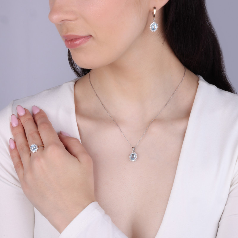 Pierścionek srebrny z niebieską cyrkonią i złotą blaszką