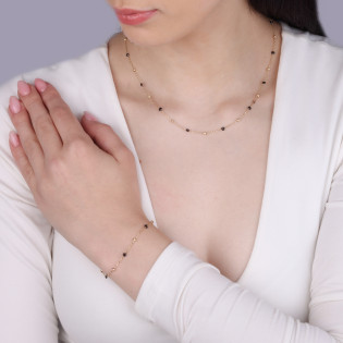 Bransoleta złota z żółtymi i czarnymi kulkami próba 585