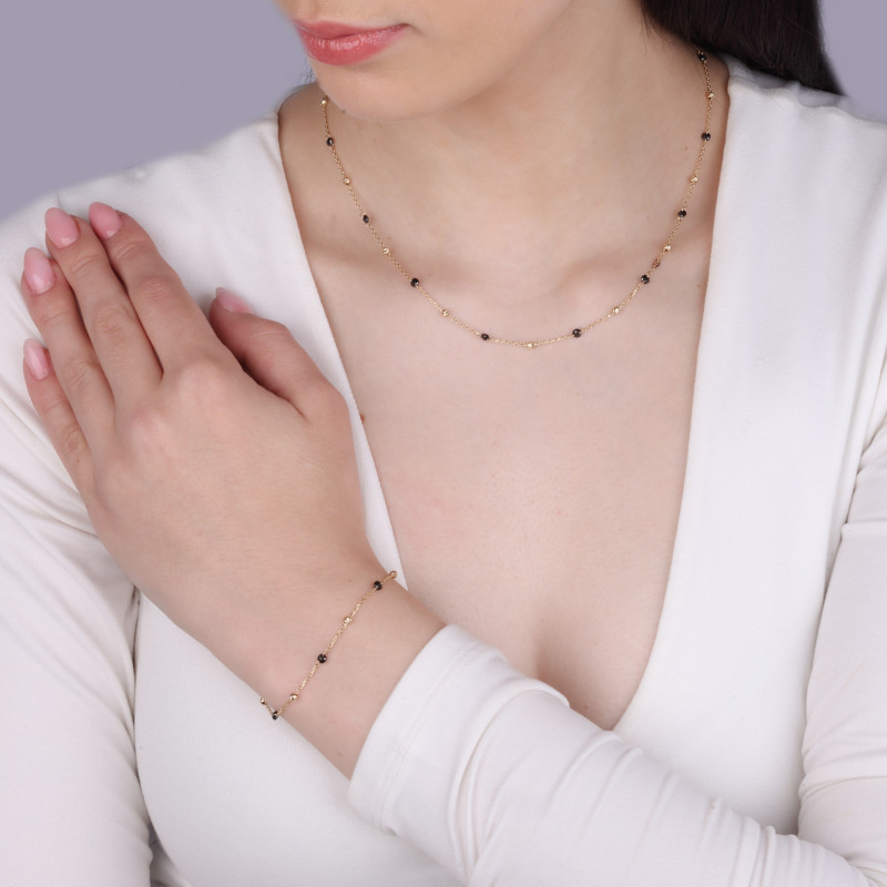 Bransoleta złota z żółtymi i czarnymi kulkami próba 585