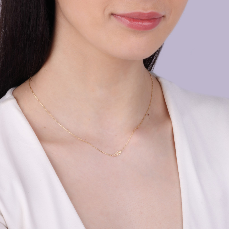 Naszyjnik złoty z ażurowym skrzydłem