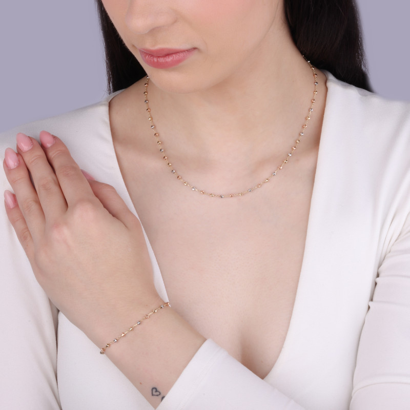 Naszyjnik złoty z grawerowanymi kulkami w trzech kolorach