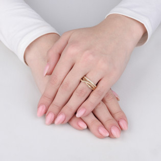 Pierścionek złoty rings z cyrkoniami i węzłem