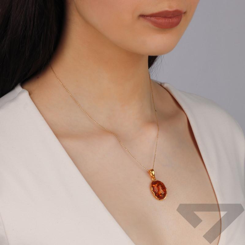 Zawieszka srebrna pozłacana owalny bursztyn koniakowy próba 925