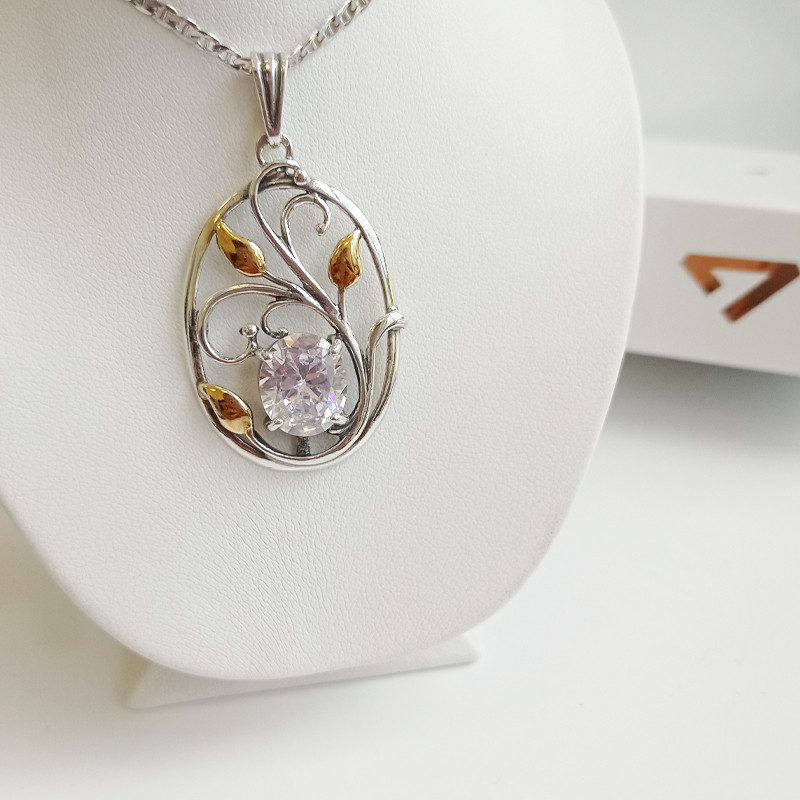 Zawieszka srebrna ażurowy owal z cyrkonią i pozłacanymi listkami TB 03471-03470 próba 925