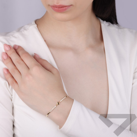 Bransoleta pozłacana z rzędem cyrkonii i sercem