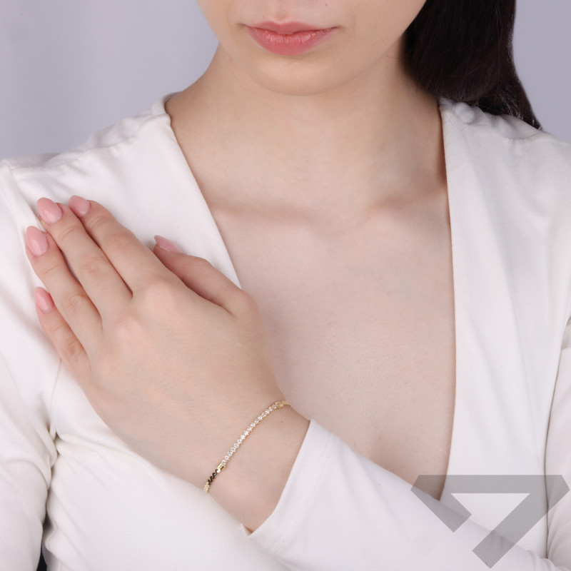 Bransoleta pozłacana z białymi cyrkoniami