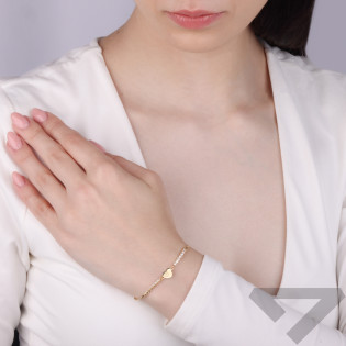 Bransoleta pozłacana z sercem i rzędem cyrkonii