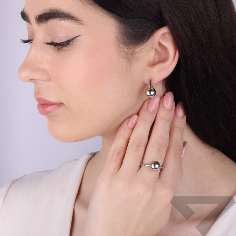 Pierścionek srebrny z kulką i złotą pałką