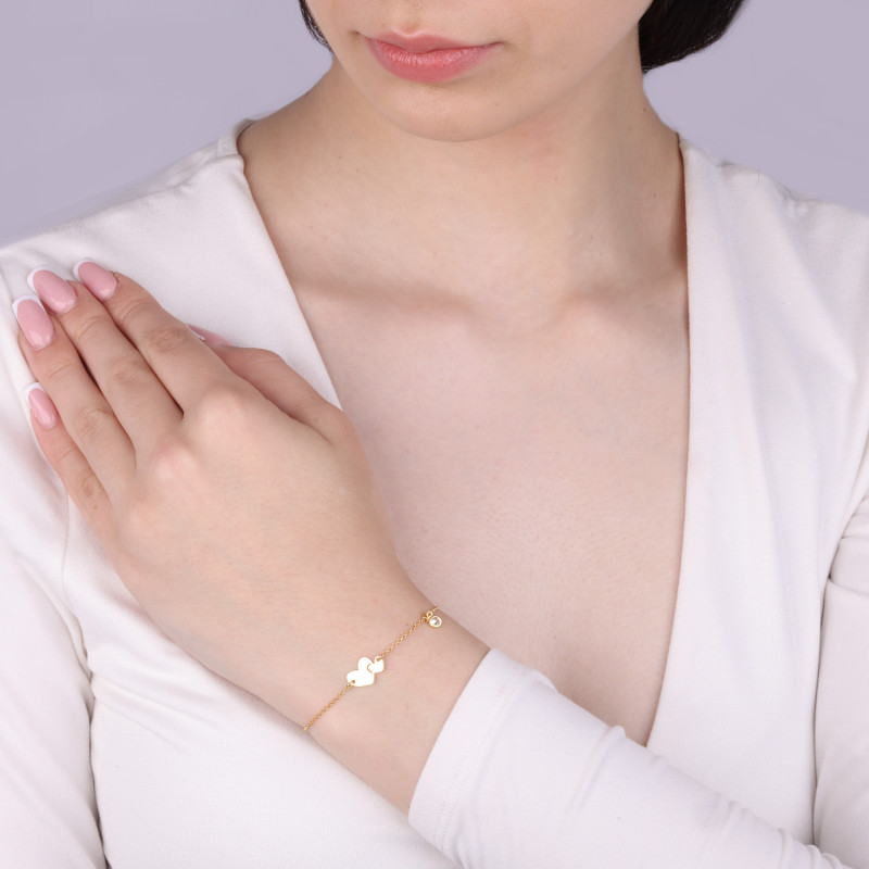 Bransoleta srebrna pozłacana z dwoma sercami i cyrkonią