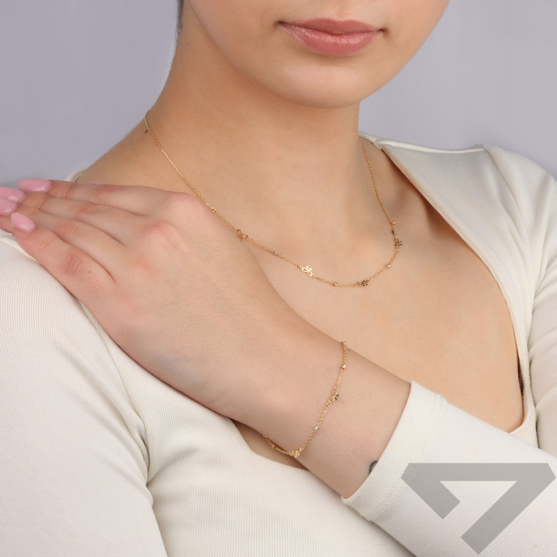 Złota bransoletka damska kulki i kokardki pr. 585 - JubilerSezam.pl