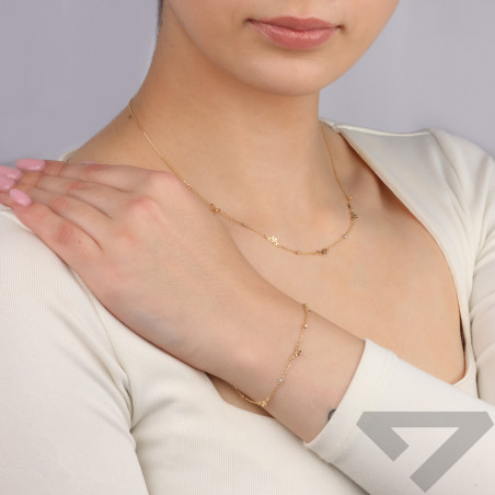 Złota bransoletka damska kulki i kokardki pr. 585 - JubilerSezam.pl