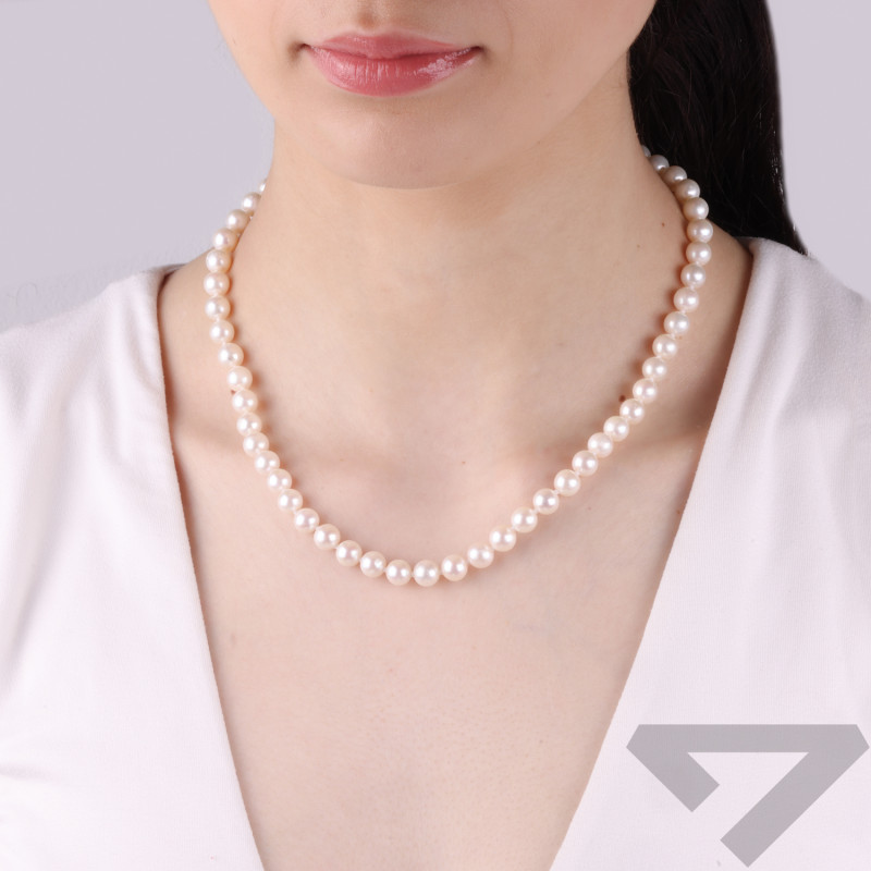 Naszyjnik z naturalną perłą z zapięciem srebrnym na kulkę