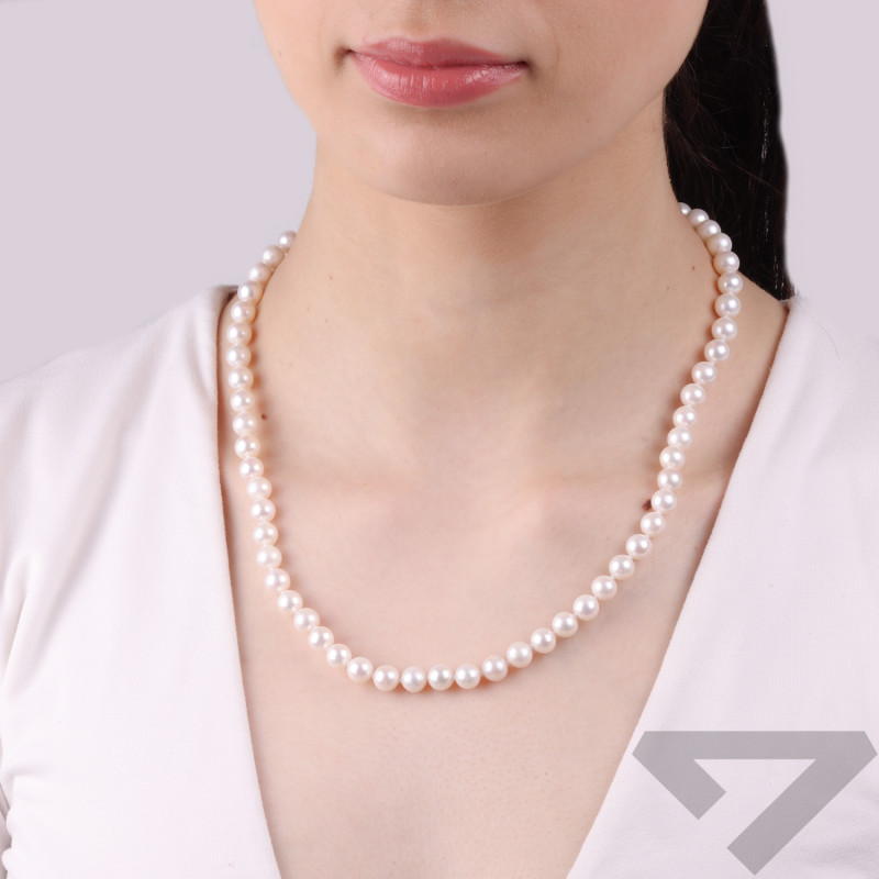 Naszyjnik z naturalną perłą z zapięciem srebrnym na kulkę