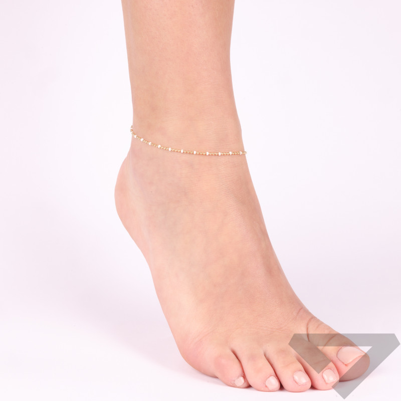 Bransoleta srebrna na nogę kulki koloru złotego i biała emalia