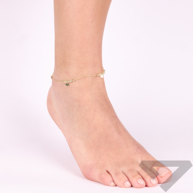 Bransoleta na nogę srebro koloru złotego z kulkami i wiszącymi sercami
