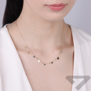 Naszyjnik złoty z wiszacymi blaszkami w kształcie serc, koniczyn, gwiazdek