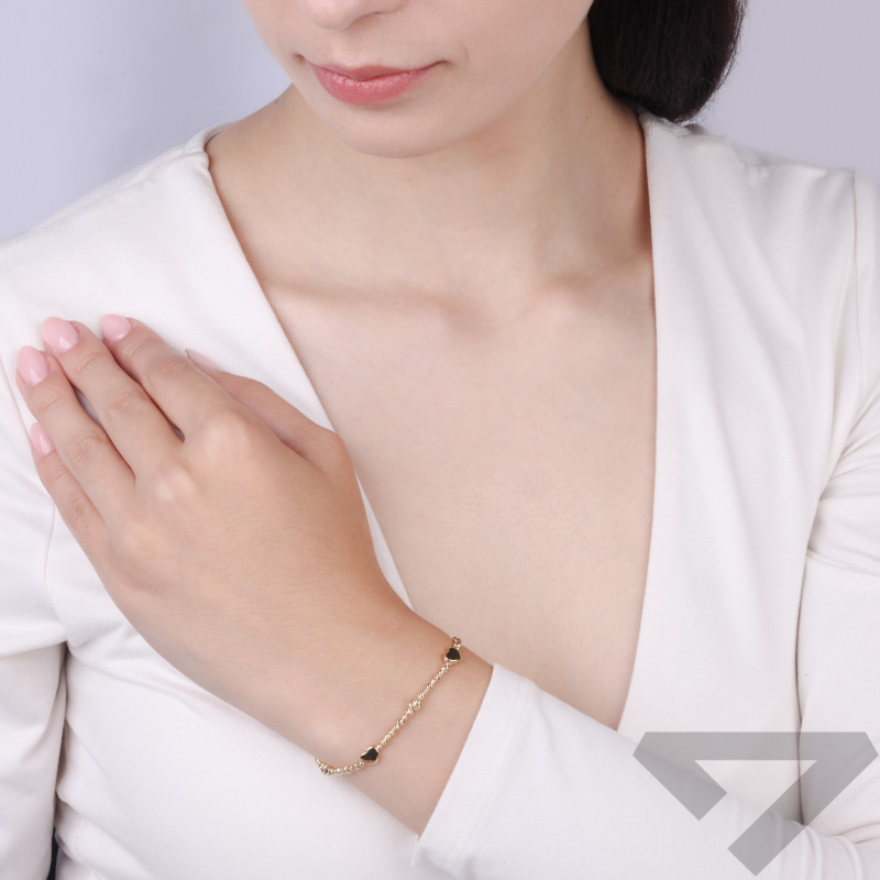 Bransoletka ze złota gładkie serca z grawerowanymi kulkami