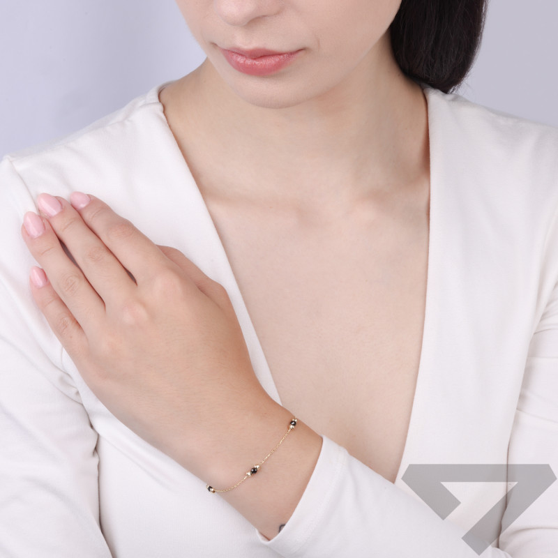 Bransoleta złota czarne cyrkonie faset i kulki grawer