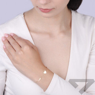 Bransoletka złota serce blaszka z ażurowymi skrzydłami