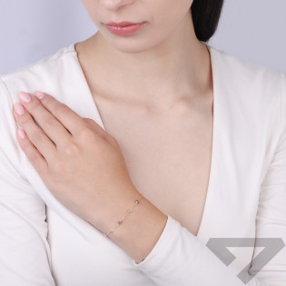 Bransoletka złota z kulkami grawerowanymi i kolorowymi cyrkoniami