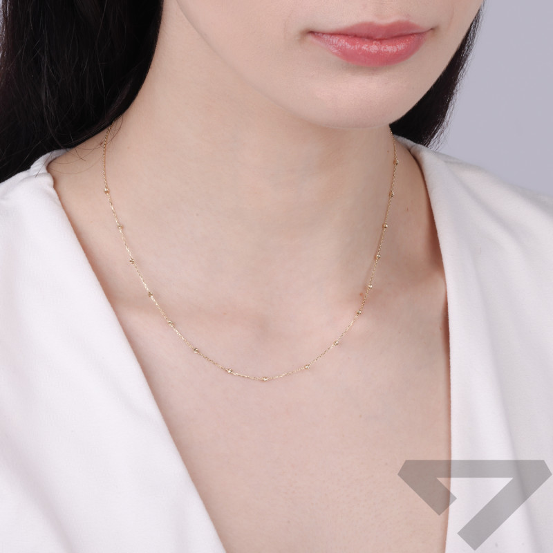 Naszyjnik złoty z kulkami grawerowanymi