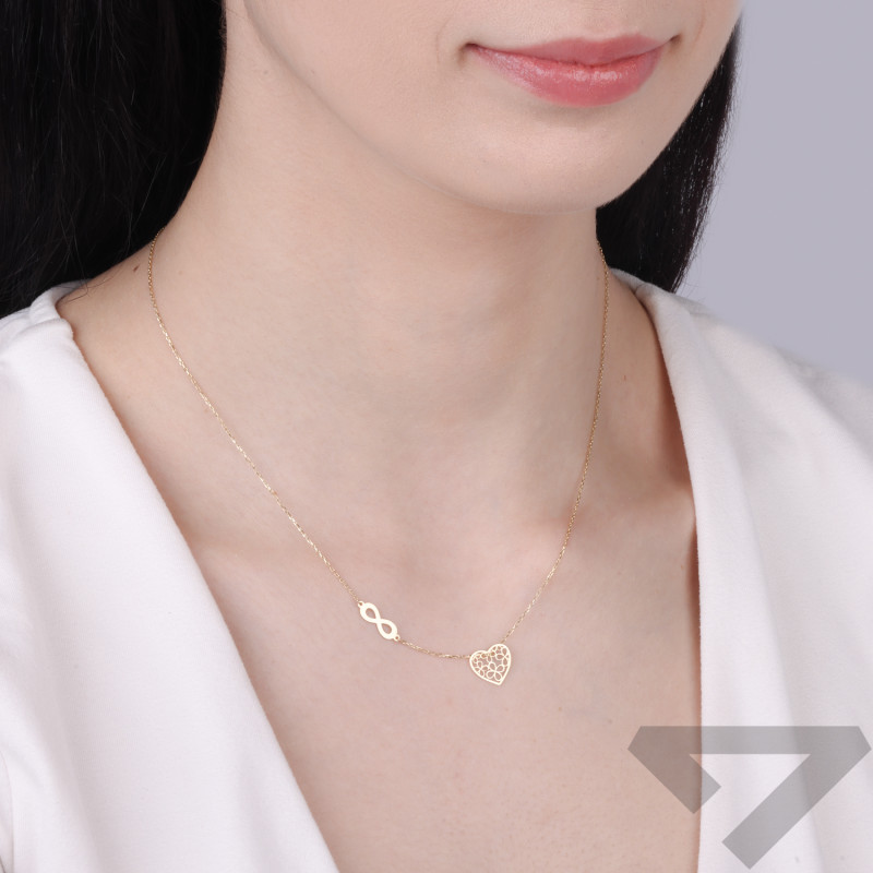 Naszyjnik złoty ażurowe serce i symbol nieskończoności