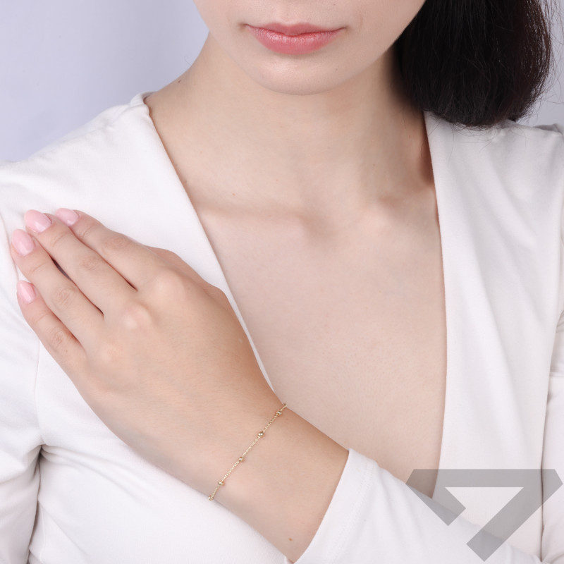 Bransoletka złota z gładkimi kulkami na ankerze